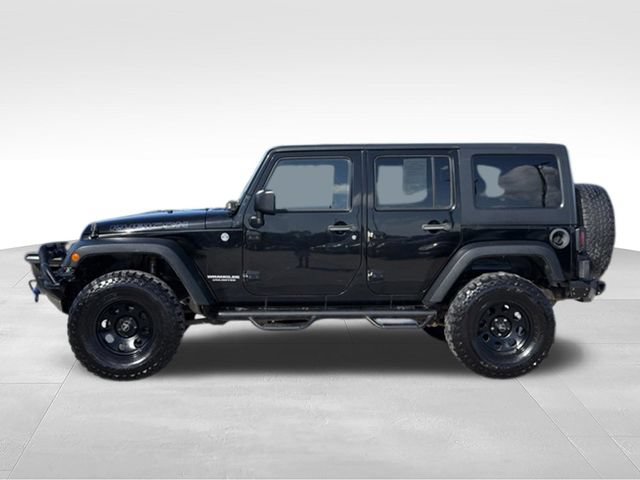 Used 2015 Jeep Wrangler Unlimited Rubicon w/ Dual Top Group AWD/4WD image 2