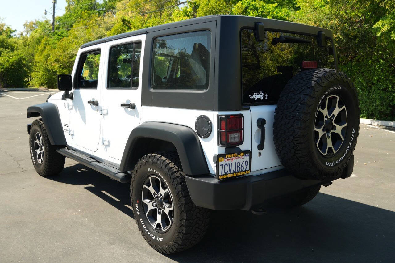 Used 2014 Jeep Wrangler Unlimited Sport w/ Mopar Black Appearance Group AWD/4WD image 4