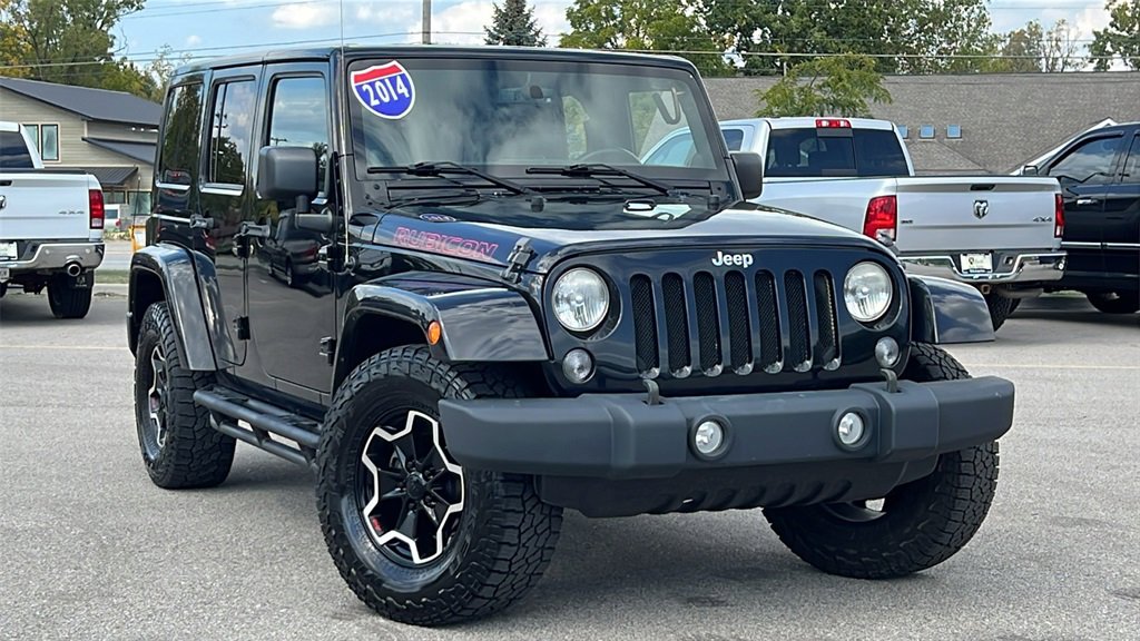 Used 2014 Jeep Wrangler Unlimited Rubicon w/ Dual Top Group image 2