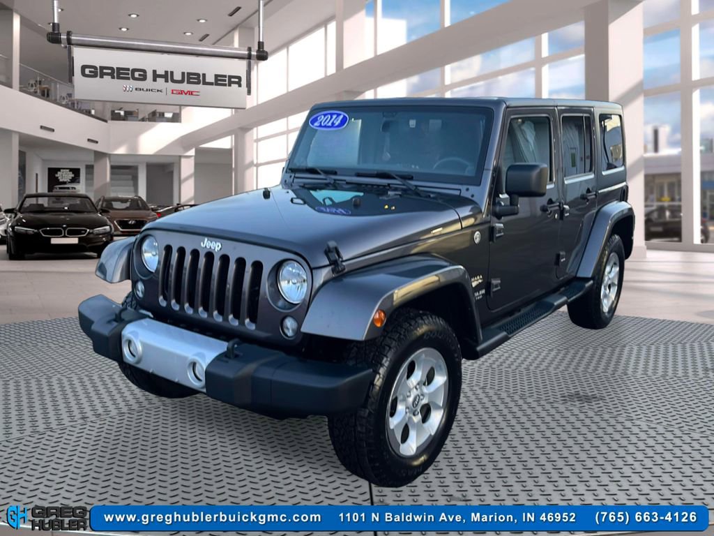 Used 2014 Jeep Wrangler Unlimited Sahara w/ Dual Top Group image 1