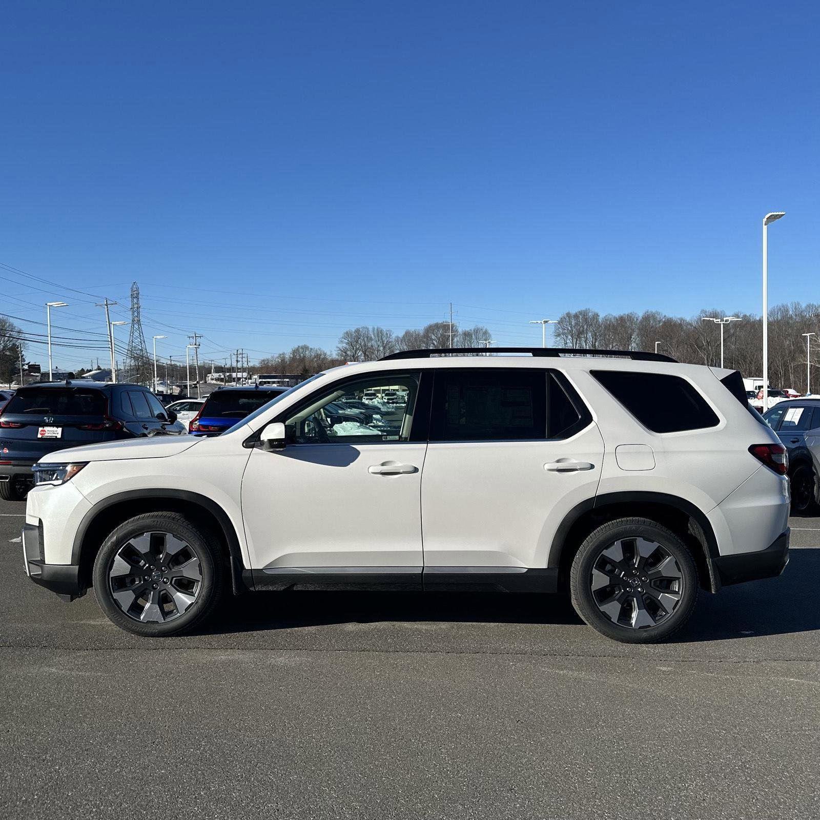 New 2026 Honda Pilot Touring image 2