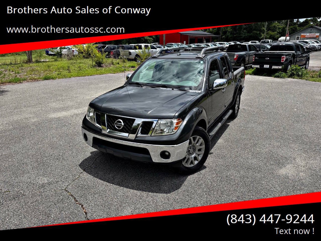 Used 2011 Nissan Frontier SL RWD image 1