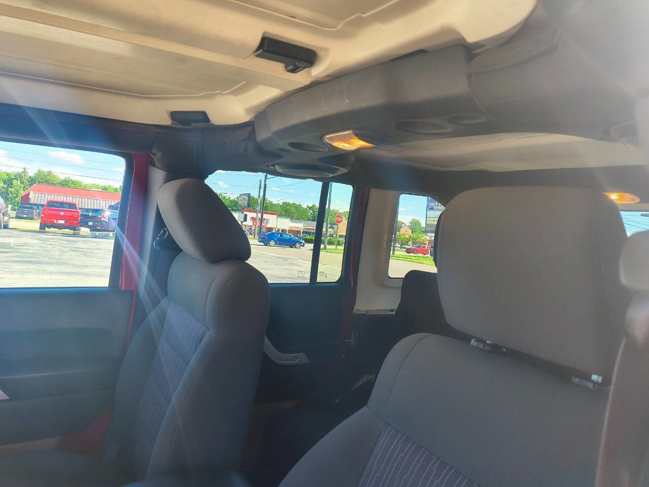 Used 2011 Jeep Wrangler Unlimited Sahara w/ Dual Top Group AWD/4WD image 21