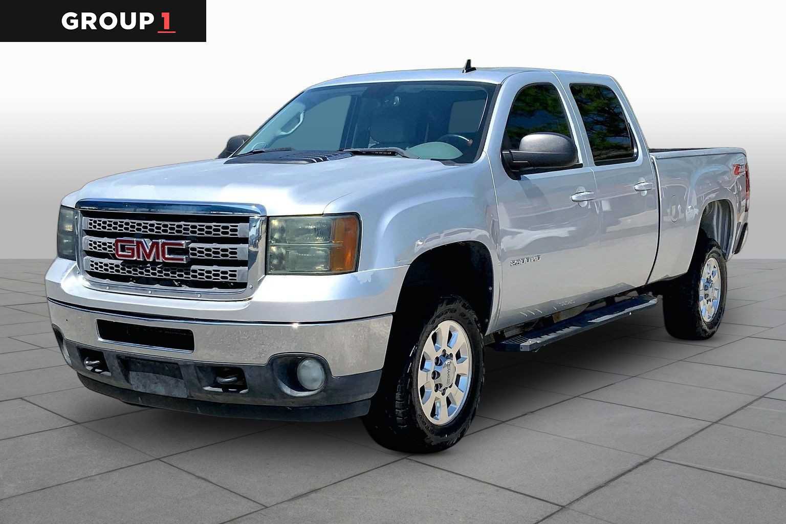 Used 2014 GMC Sierra 2500 SLT w/ Suspension Package, Off-Road AWD/4WD image 1