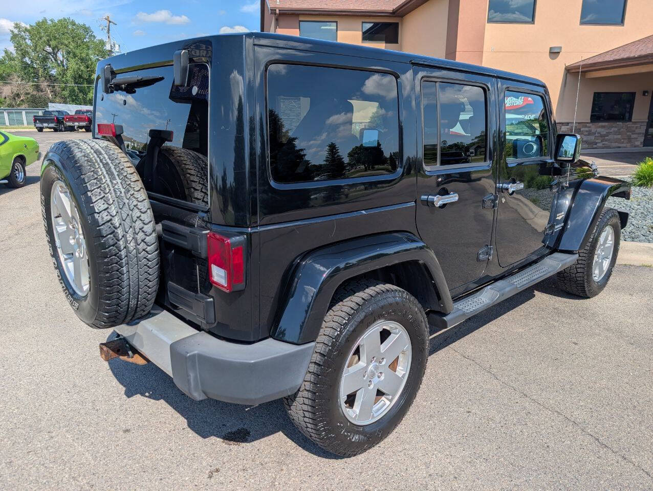 Used 2012 Jeep Wrangler Unlimited Sahara w/ Connectivity Group AWD/4WD image 9