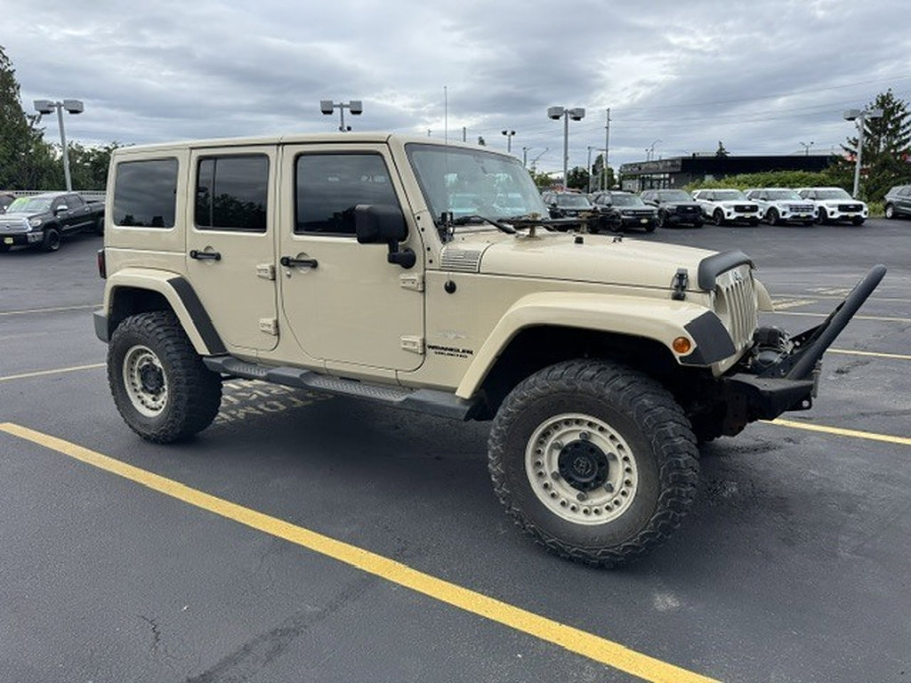 Used 2011 Jeep Wrangler Unlimited Sahara w/ Connectivity Group AWD/4WD image 1