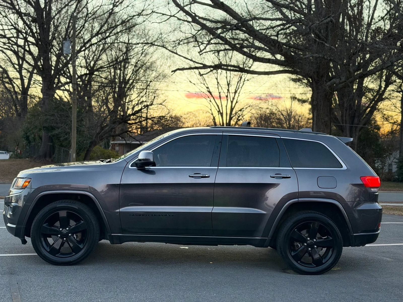 Used 2015 Jeep Grand Cherokee Altitude AWD/4WD image 3