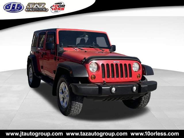 Used 2013 Jeep Wrangler Unlimited Sahara w/ Dual Top Group AWD/4WD image 1