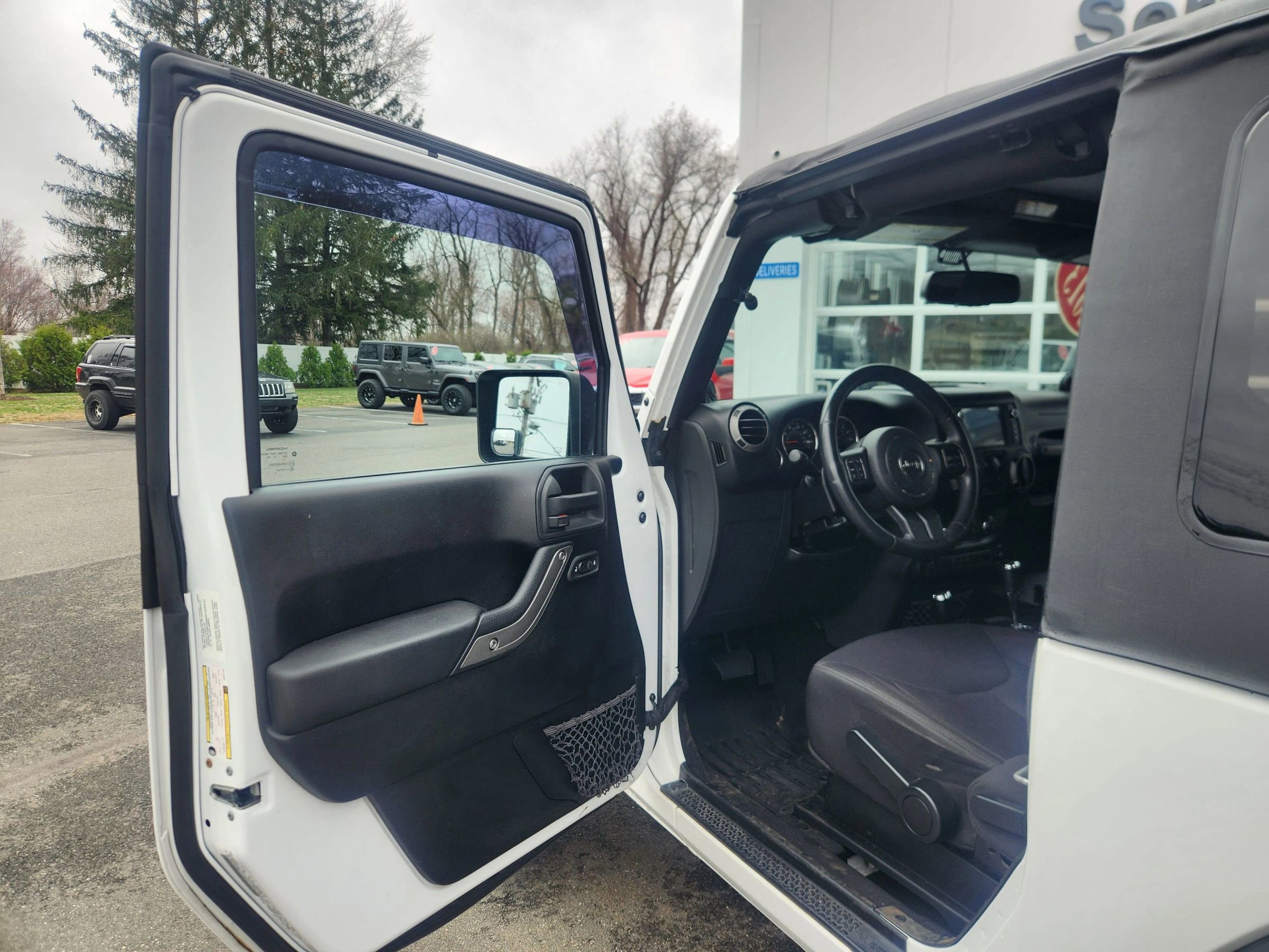 Used 2013 Jeep Wrangler Sport AWD/4WD image 25