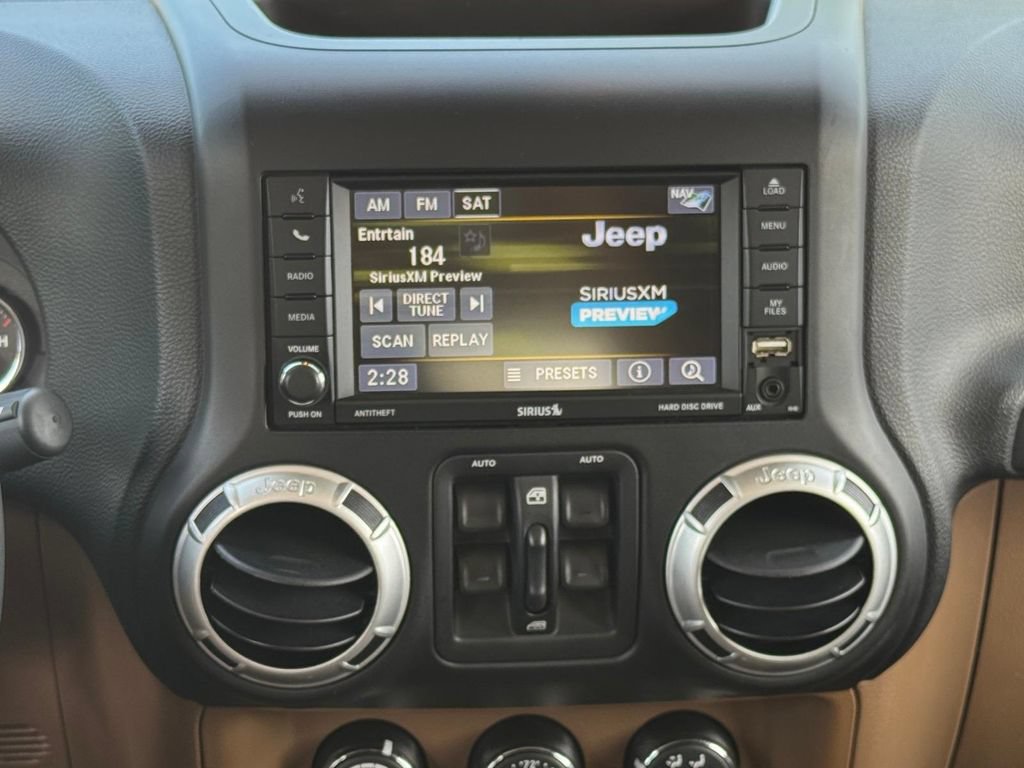 Used 2013 Jeep Wrangler Unlimited Sahara w/ Dual Top Group AWD/4WD image 14