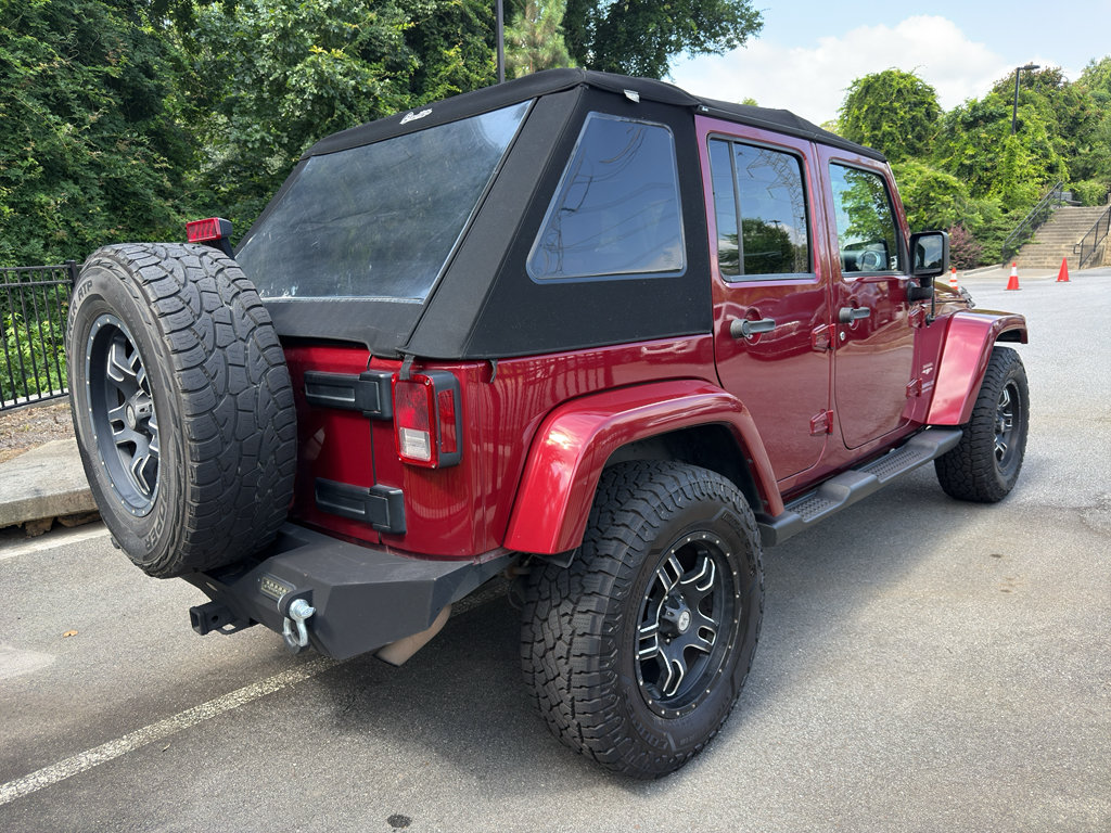 Used 2012 Jeep Wrangler Unlimited Sahara w/ Dual Top Group AWD/4WD image 3