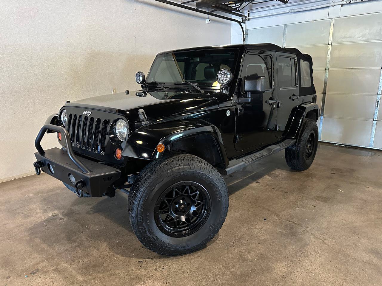 Used 2012 Jeep Wrangler Unlimited Sahara AWD/4WD image 1