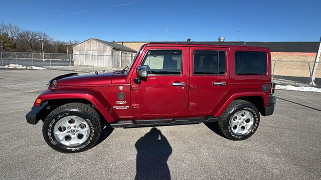 Used 2013 Jeep Wrangler Unlimited Sahara w/ Dual Top Group image 2