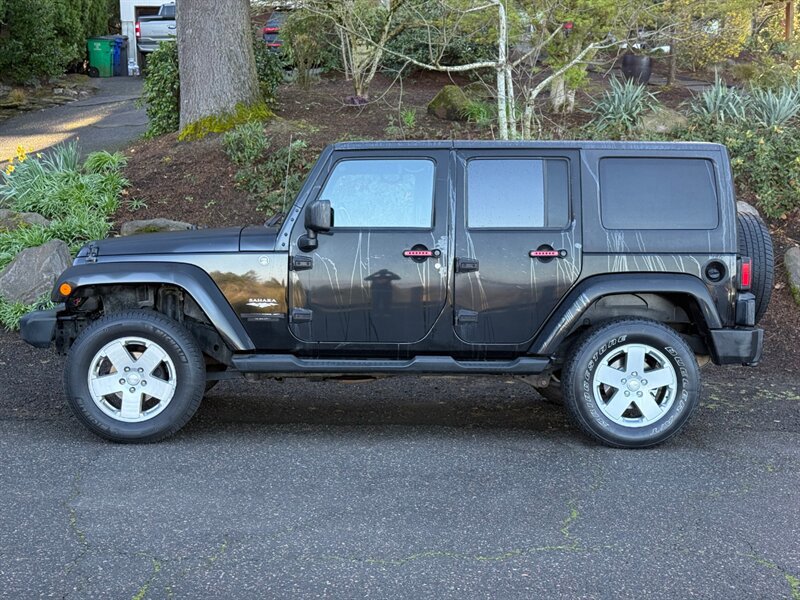 Used 2012 Jeep Wrangler Unlimited Sahara AWD/4WD image 2