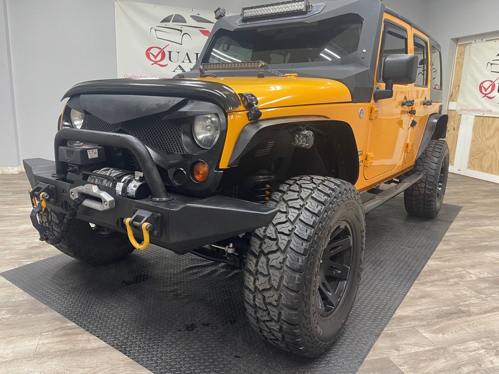 Used 2012 Jeep Wrangler Unlimited Sport AWD/4WD image 1