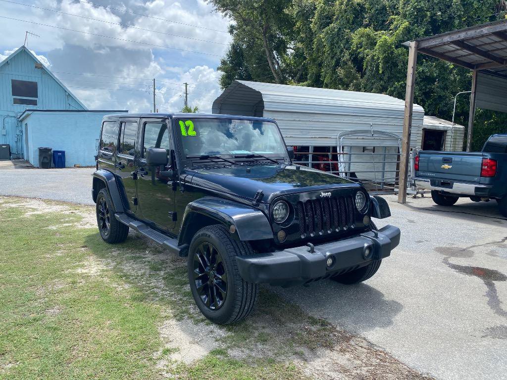 Used 2012 Jeep Wrangler Unlimited Sahara w/ Dual Top Group AWD/4WD image 5