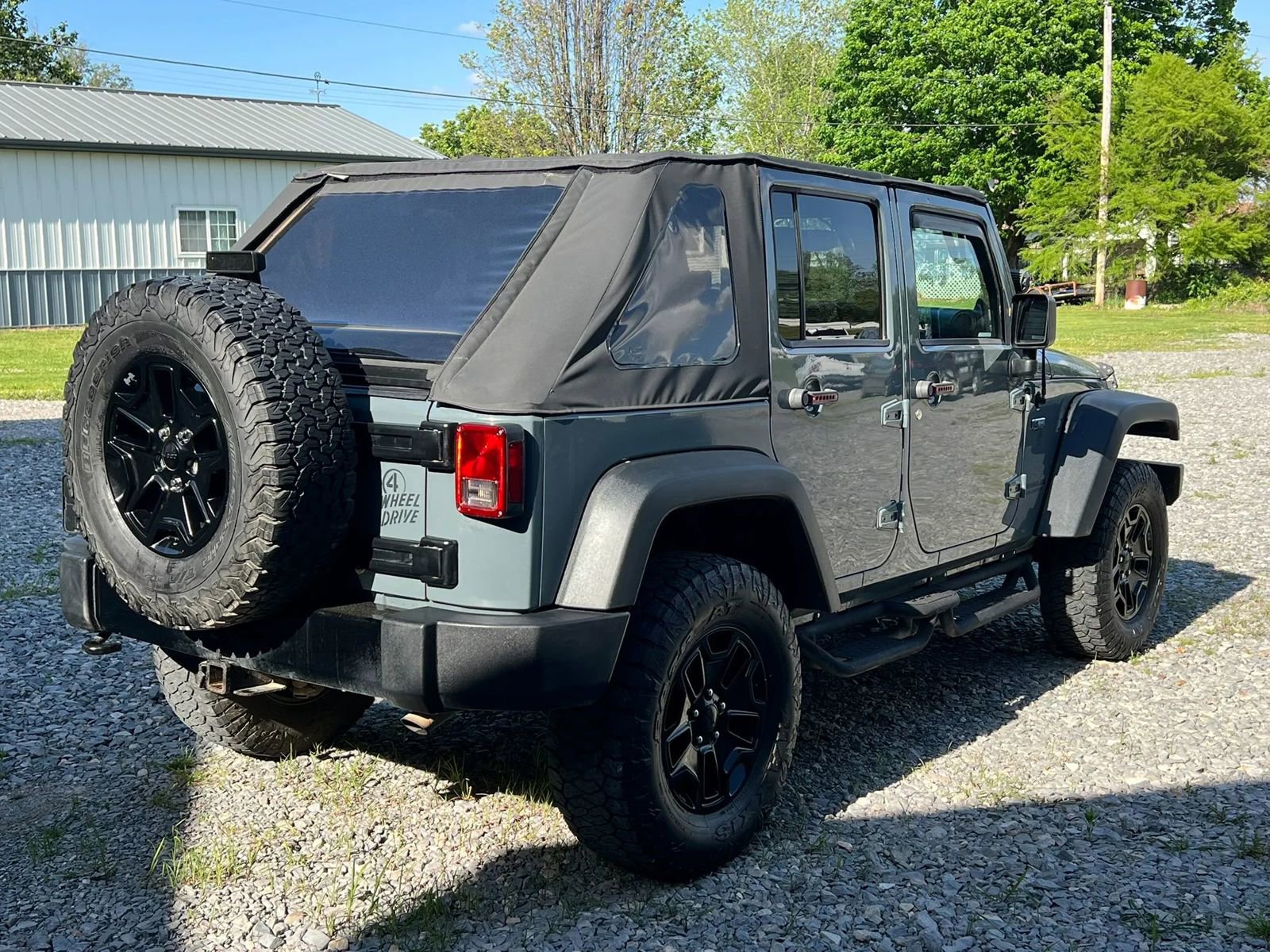 Used 2014 Jeep Wrangler Unlimited Sport w/ Dual Top Group AWD/4WD image 5