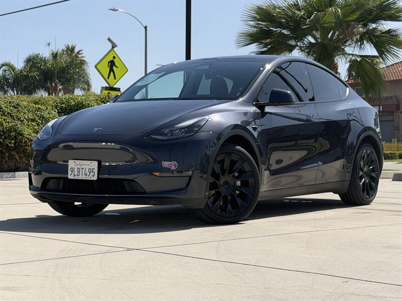 Used 2024 Tesla Model Y Long Range AWD/4WD image 1