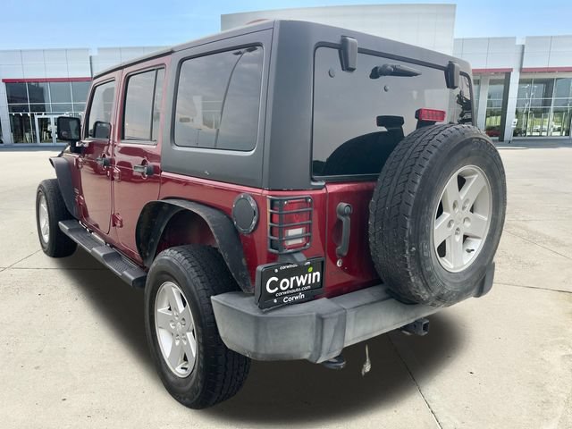 Used 2012 Jeep Wrangler Unlimited Sport AWD/4WD video 3