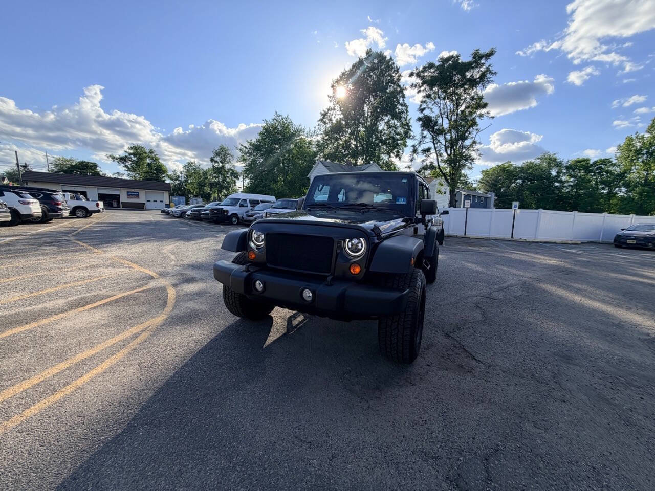 Used 2012 Jeep Wrangler Unlimited Sport w/ Trailer Tow Group AWD/4WD image 2