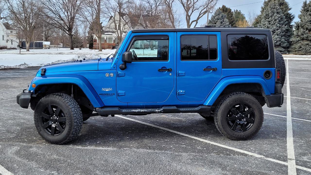 Used 2014 Jeep Wrangler Unlimited Sahara w/ Dual Top Group AWD/4WD image 3