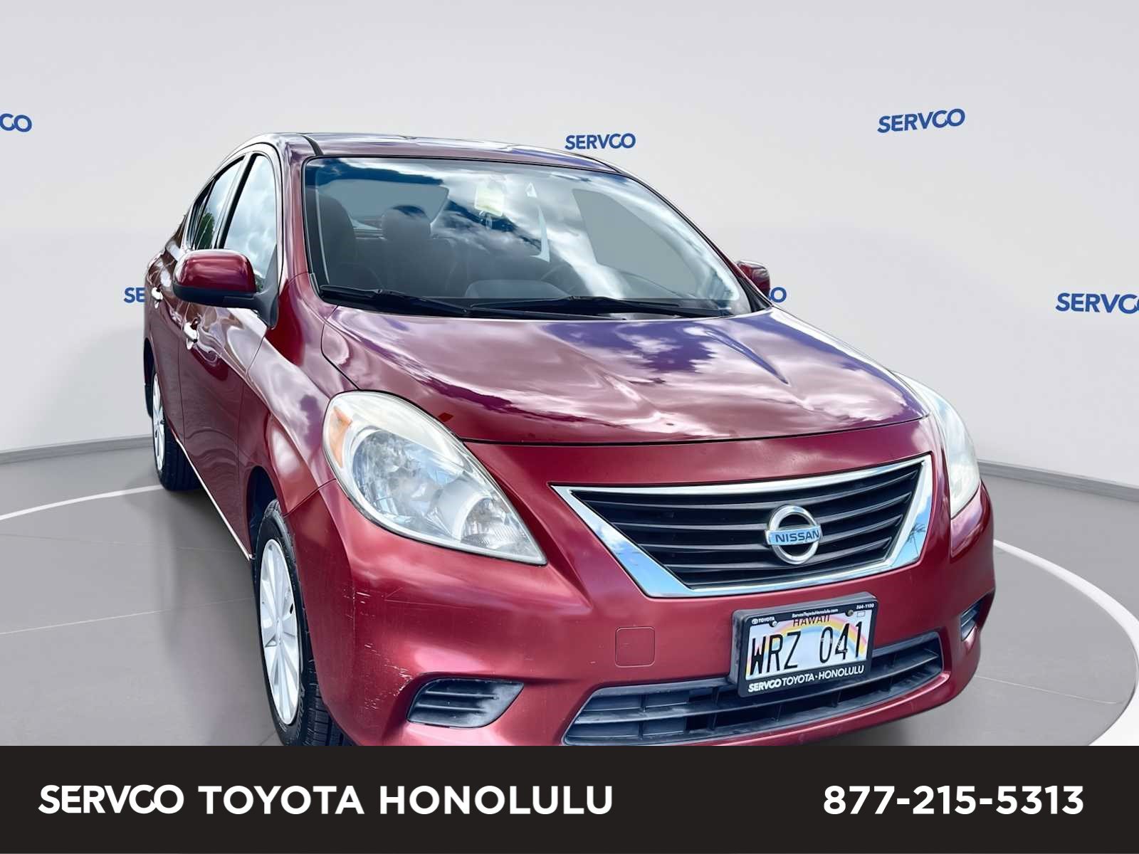 Used 2014 Nissan Versa SV FWD image 1