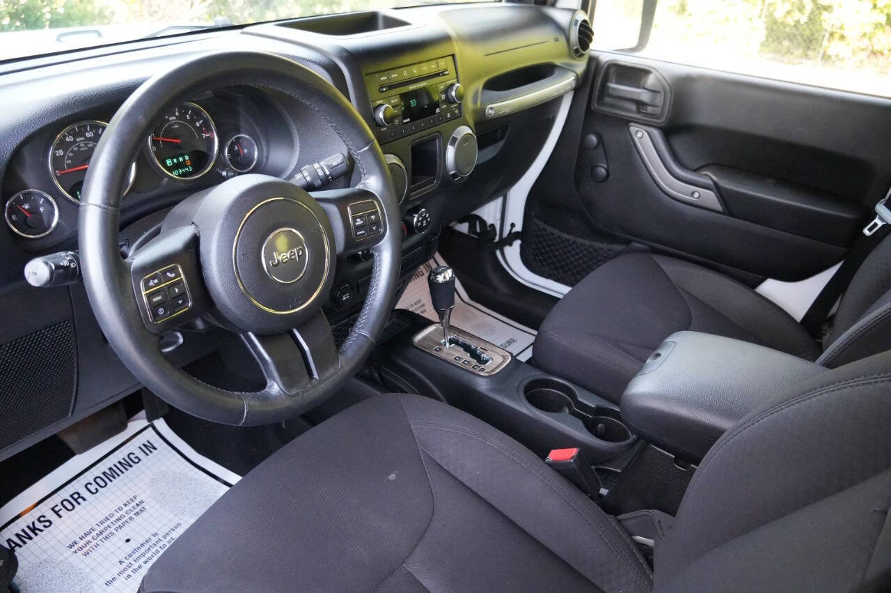 Used 2014 Jeep Wrangler Unlimited Sport w/ Mopar Black Appearance Group AWD/4WD image 12