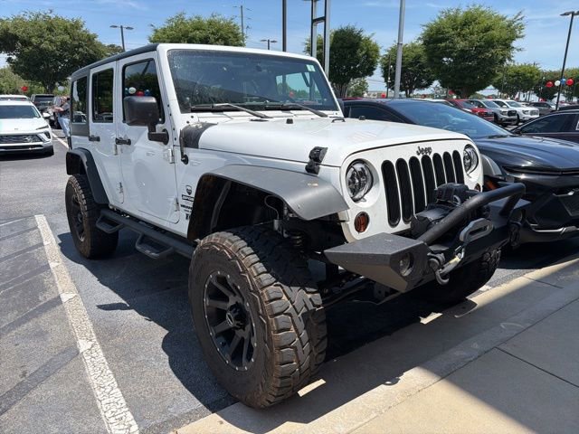 Used 2012 Jeep Wrangler Unlimited Sport AWD/4WD video 1