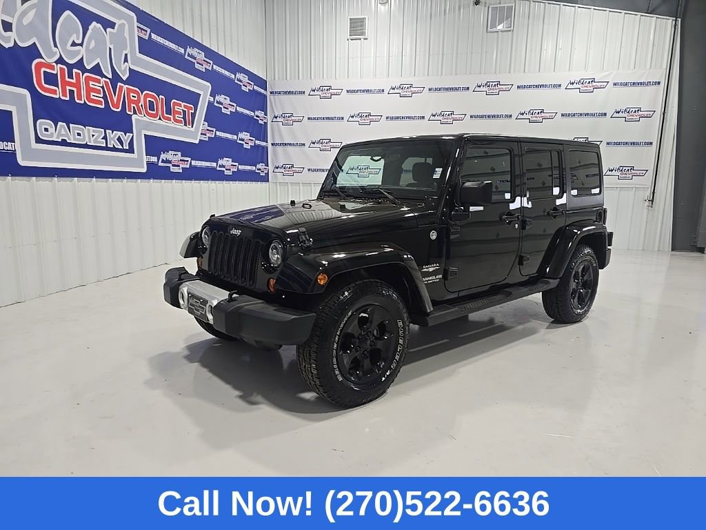 Used 2012 Jeep Wrangler Unlimited Sahara w/ Dual Top Group AWD/4WD image 1