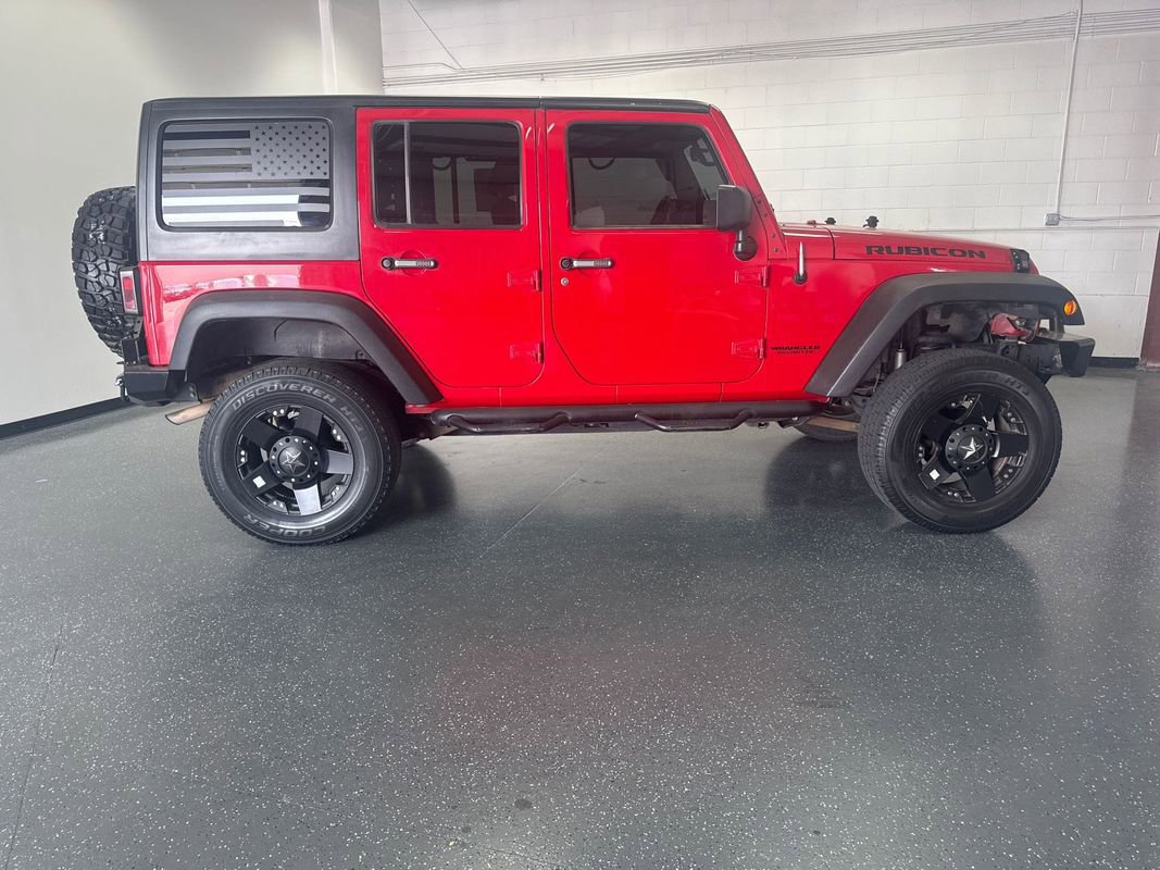 Used 2012 Jeep Wrangler Unlimited Rubicon w/ Dual Top Group image 3