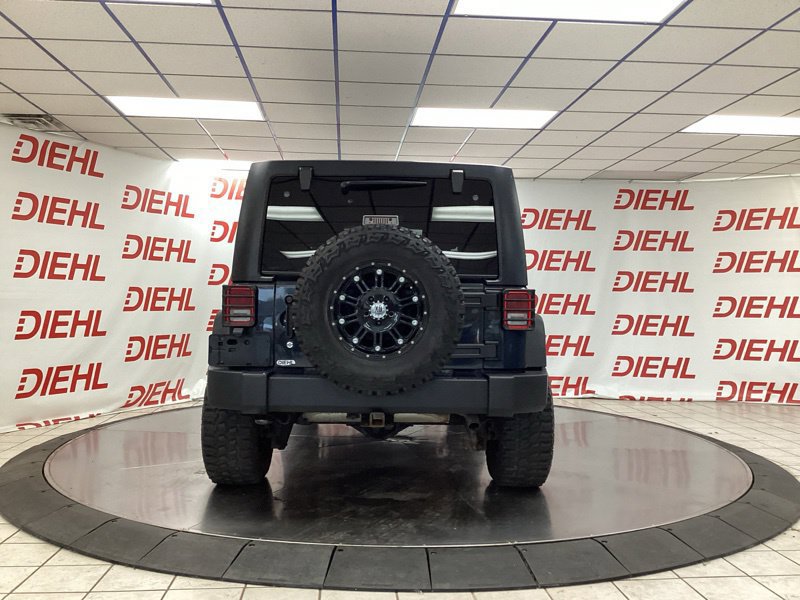 Used 2017 Jeep Wrangler Unlimited Sport w/ Mopar Black Appearance Group AWD/4WD image 6