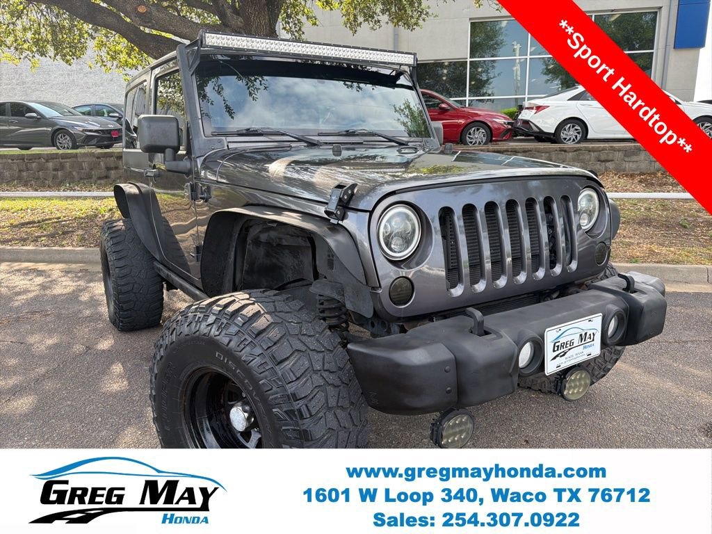 Used 2014 Jeep Wrangler Sport image 1