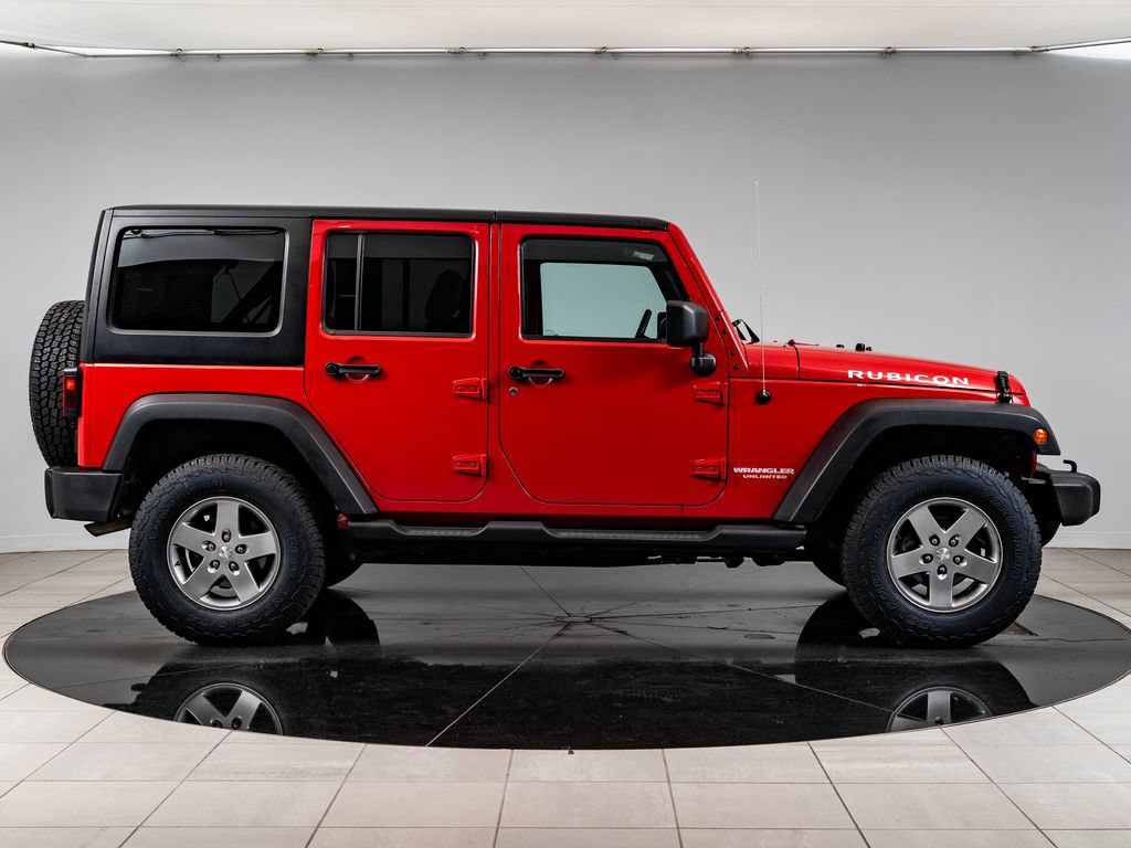 Used 2012 Jeep Wrangler Unlimited Rubicon w/ Dual Top Group AWD/4WD image 11