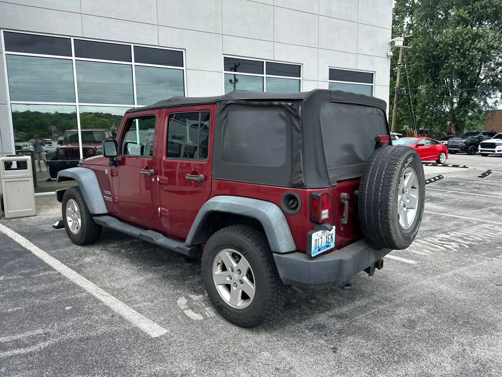 Used 2012 Jeep Wrangler Unlimited Sport w/ Dual Top Group AWD/4WD image 4