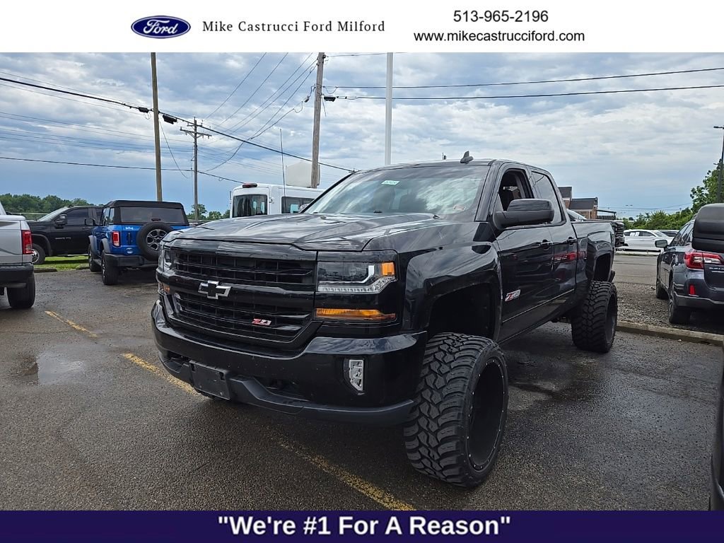 Used 2017 Chevrolet Silverado 1500 LT w/ Midnight Edition AWD/4WD image 1