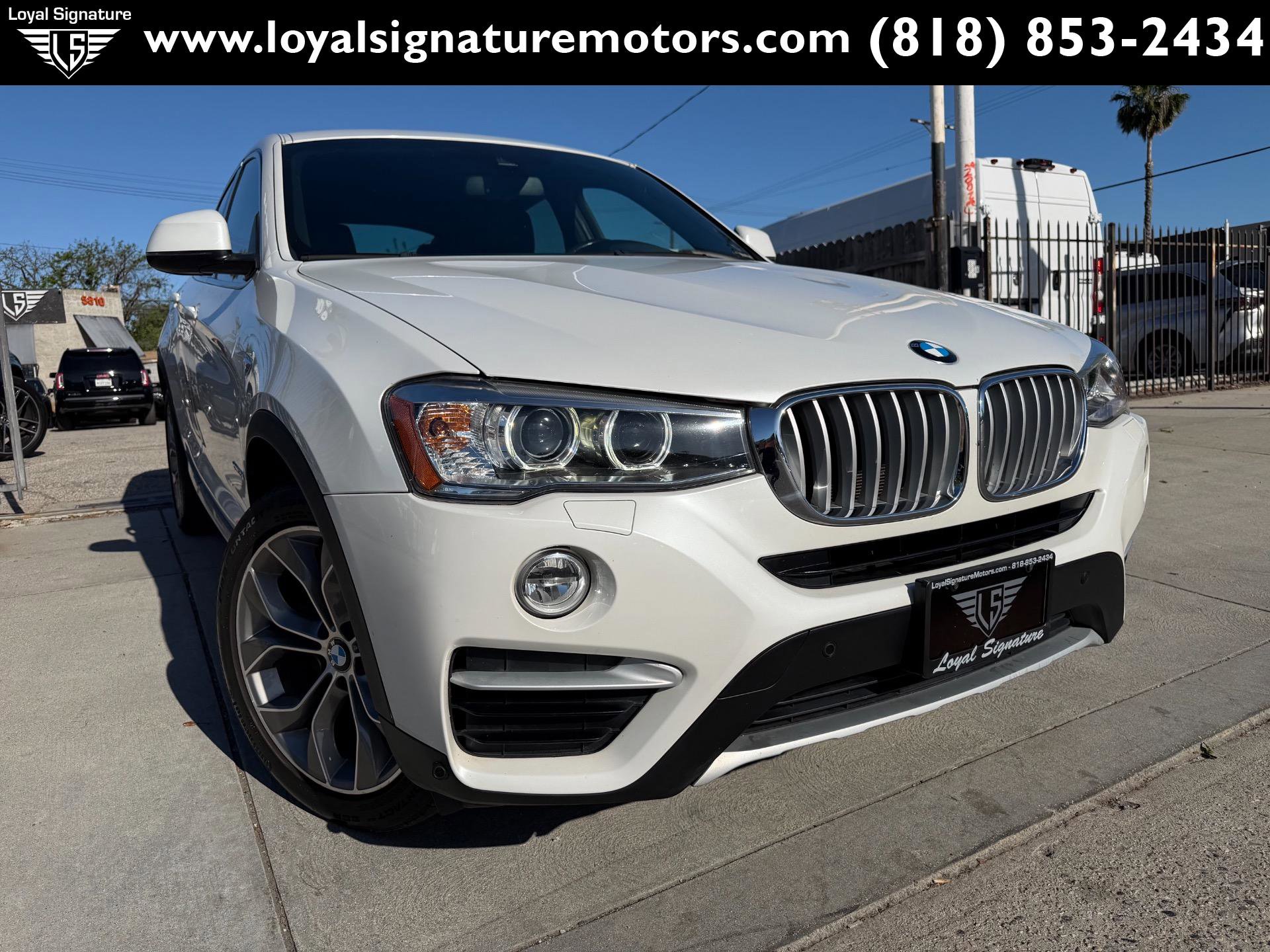 Used 2018 BMW X4 xDrive28i AWD/4WD image 1