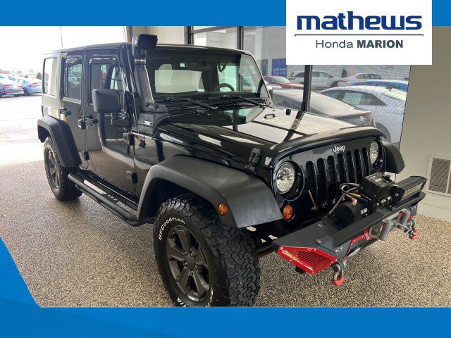 Used 2013 Jeep Wrangler Unlimited Sport image 1