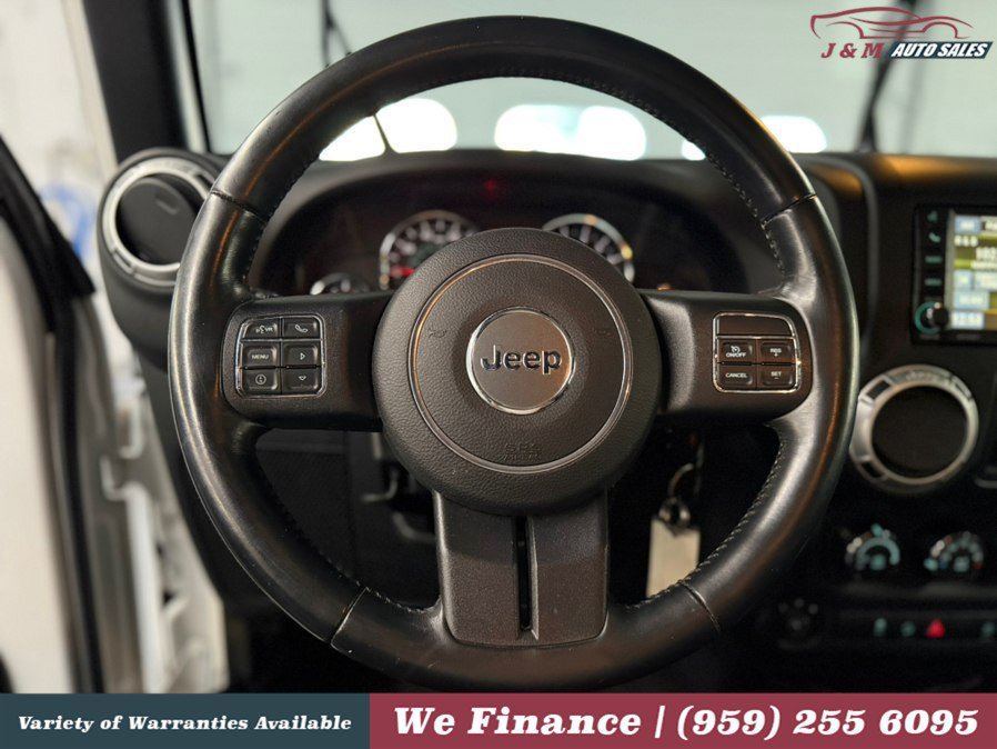 Used 2015 Jeep Wrangler Unlimited Sahara w/ Dual Top Group AWD/4WD image 21