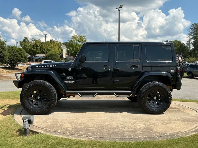 Used 2012 Jeep Wrangler Unlimited Rubicon w/ Dual Top Group AWD/4WD image 4