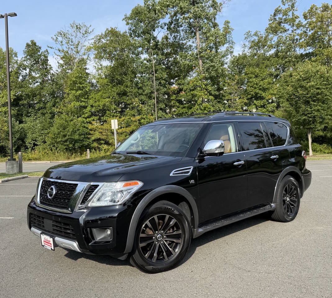 Used 2017 Nissan Armada Platinum w/ Captain Seat Package AWD/4WD image 1