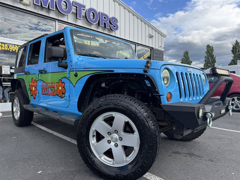 Used 2012 Jeep Wrangler Unlimited Sahara w/ Connectivity Group AWD/4WD image 1