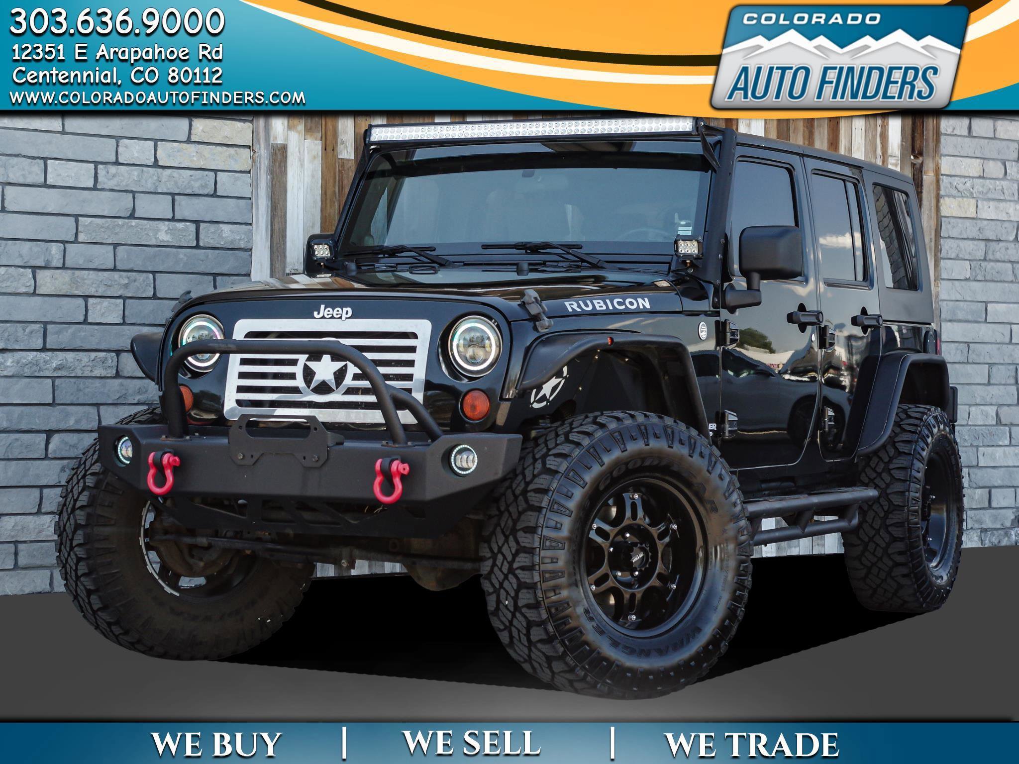 Used 2010 Jeep Wrangler Unlimited Rubicon w/ Dual Top Group image 1