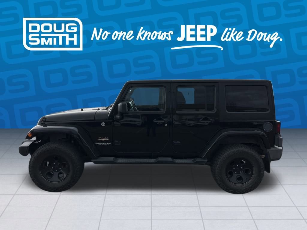 Used 2012 Jeep Wrangler Unlimited Sahara w/ Connectivity Group image 2