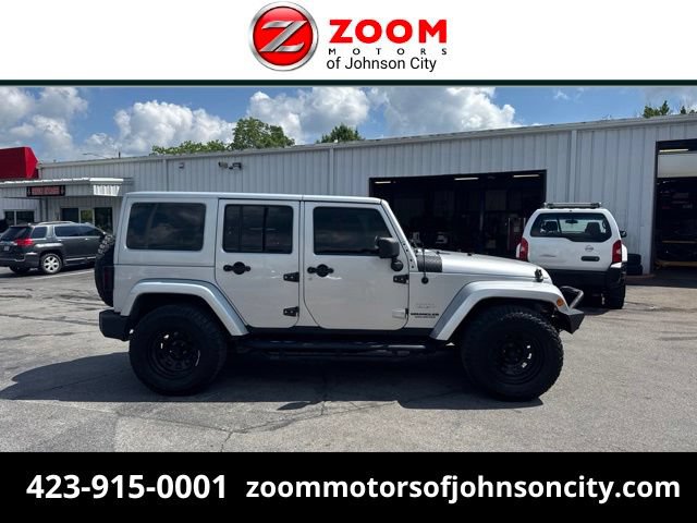 Used 2012 Jeep Wrangler Unlimited Sahara AWD/4WD image 1