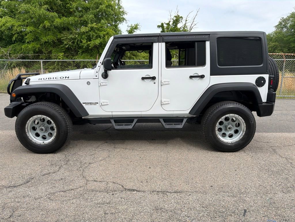 Used 2011 Jeep Wrangler Unlimited Rubicon w/ Dual Top Group AWD/4WD image 33