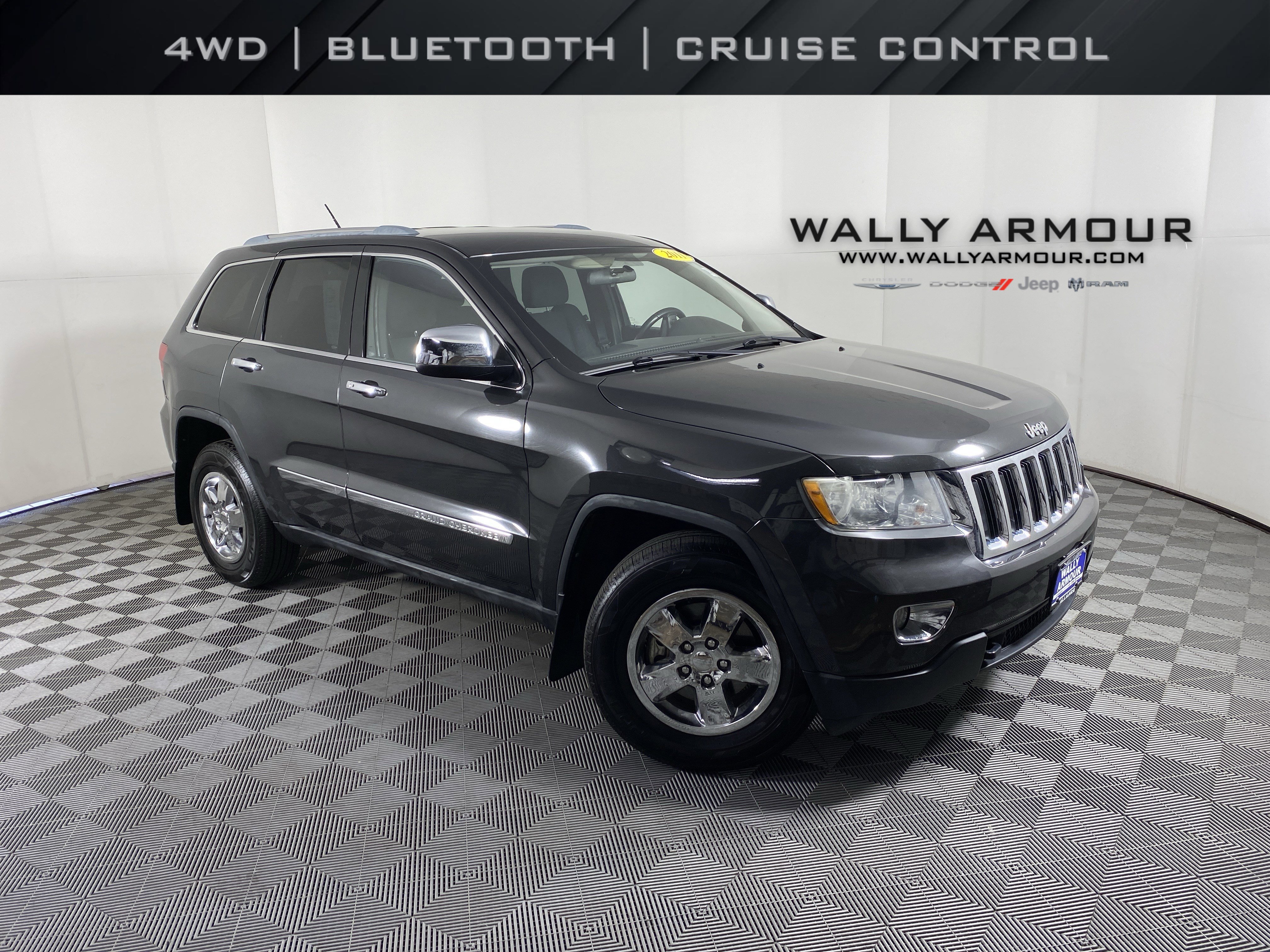 Used 2011 Jeep Grand Cherokee Laredo AWD/4WD image 1