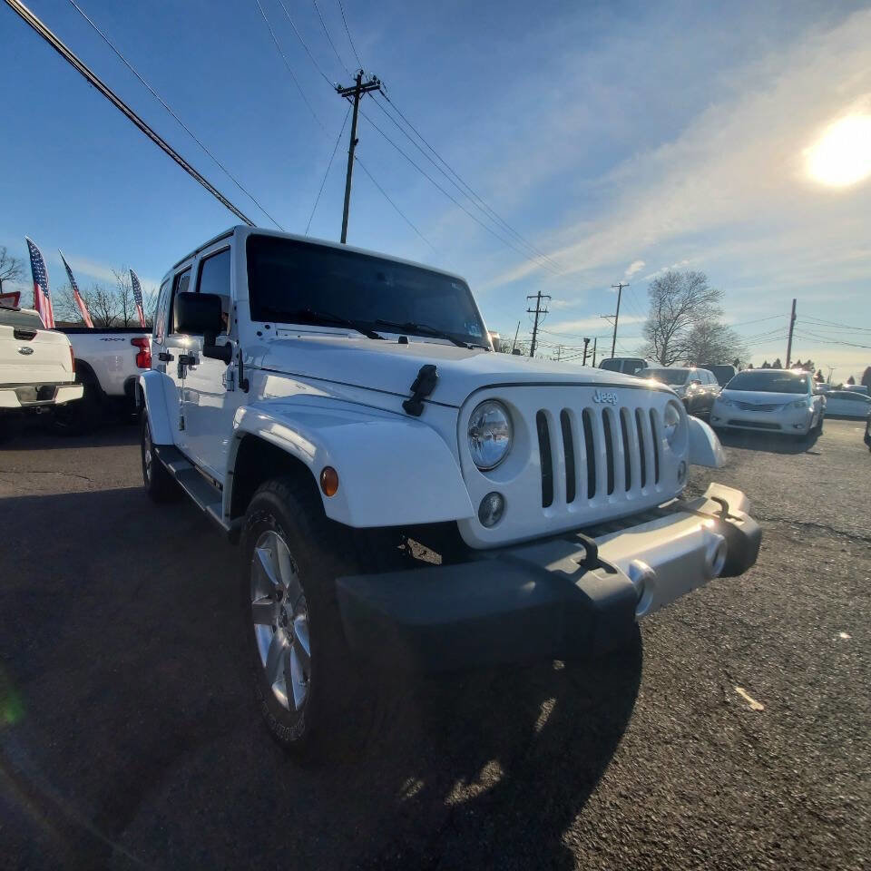 Used 2015 Jeep Wrangler Unlimited Sahara w/ Dual Top Group AWD/4WD image 7