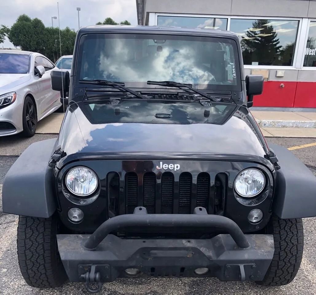 Used 2015 Jeep Wrangler Unlimited Sport w/ Mopar Black Appearance Group image 4