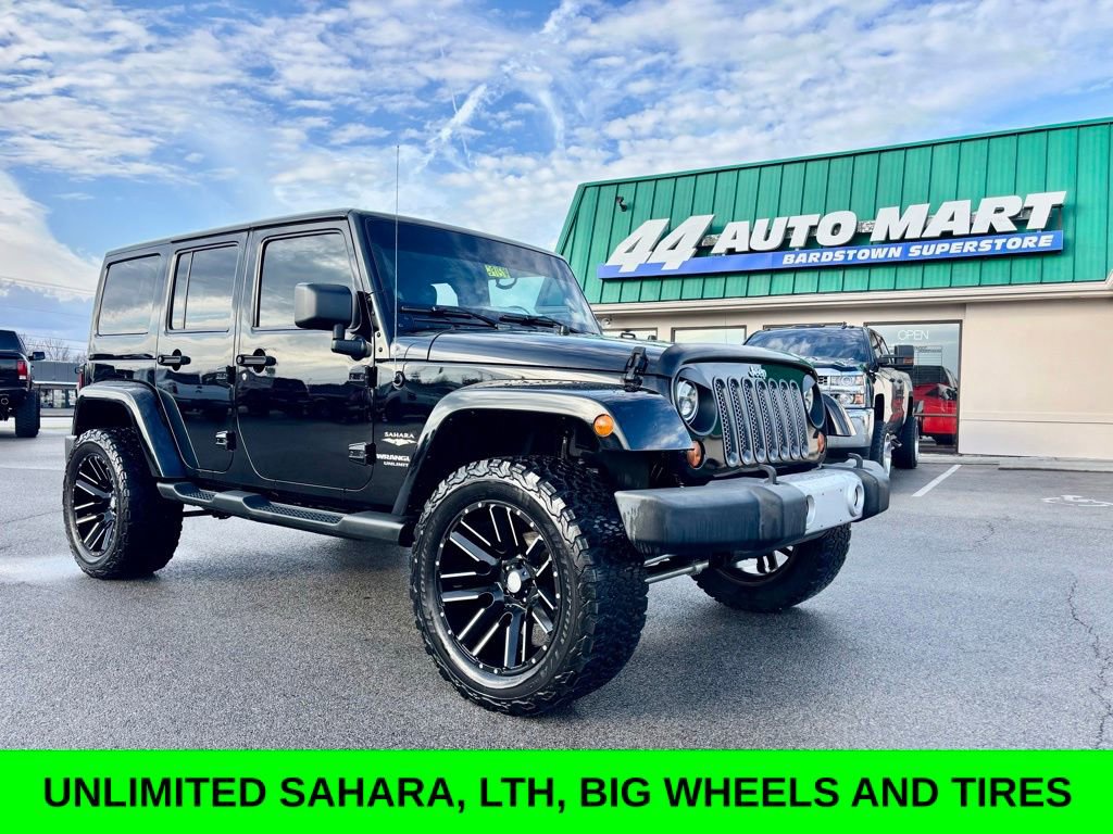 Used 2013 Jeep Wrangler Unlimited Sahara w/ Dual Top Group image 1