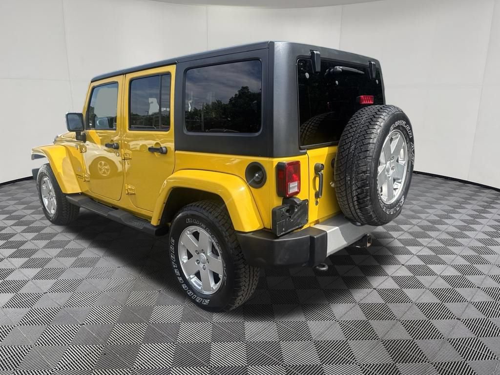 Used 2011 Jeep Wrangler Unlimited Sahara w/ Dual Top Group AWD/4WD image 15